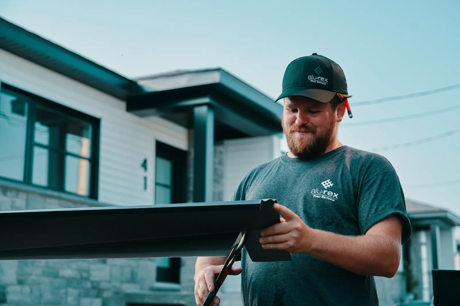 Seamless gutters and soffit around a bay window — Canadian Eavestrough, Edson AB