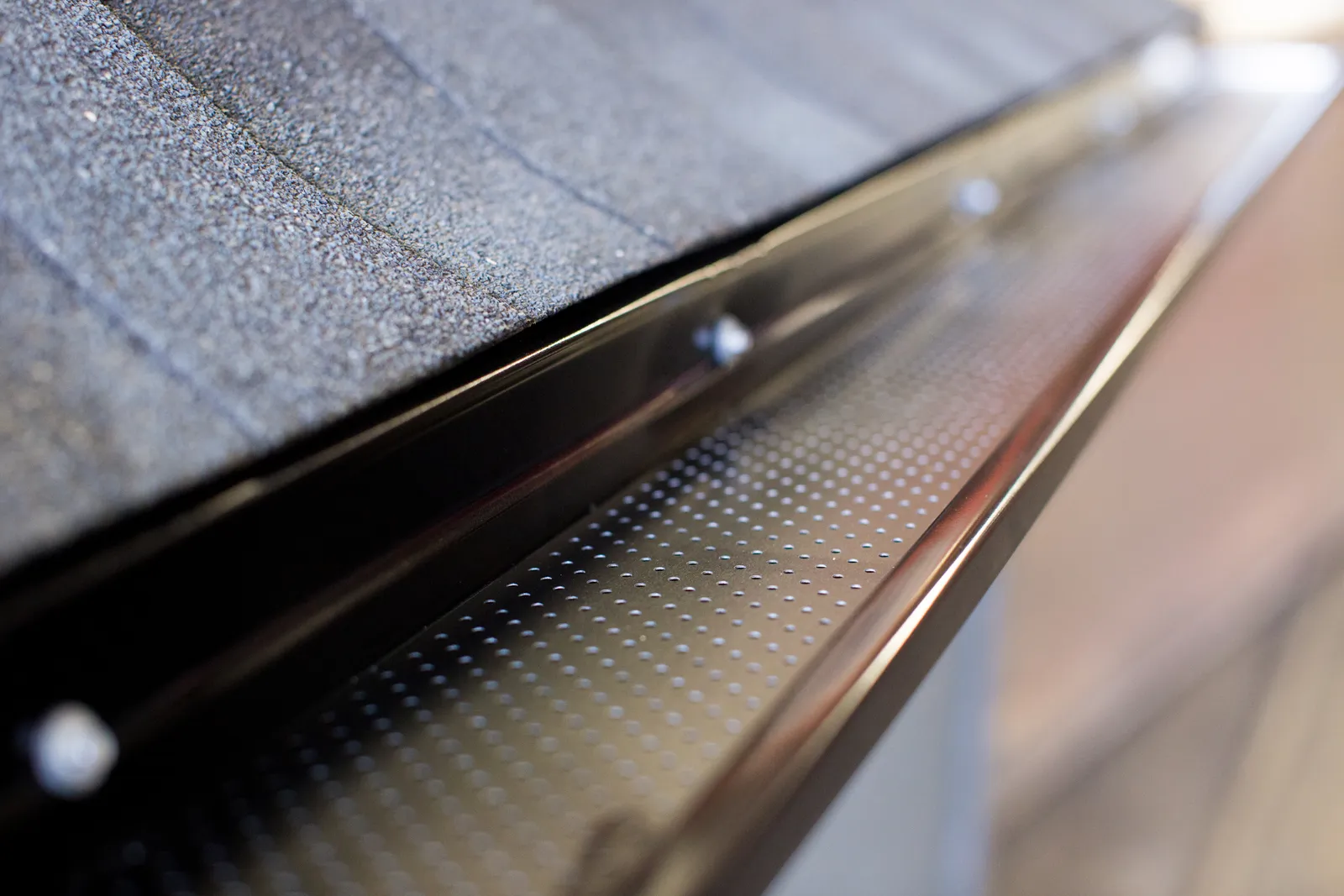 Gutter Clean System® on a metal roof gutter — Canadian Eavestrough, Edson AB